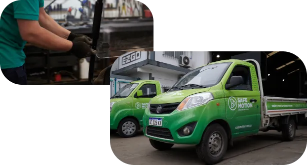 Manos trabajando y un camión verde